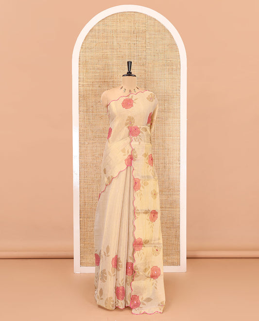 Gold and pink rose motifs printed with mirror work tissue saree, scallop embroidered border, printed pallu, and a contrast blouse