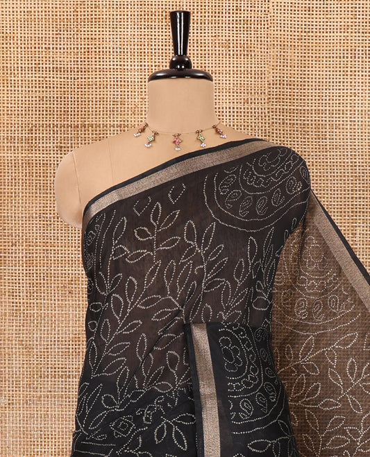 Black bandhani-style floral and chakra printed saree, zari piping border, contrast ajrakh printed pallu, and contrast ajrakh printed blouse