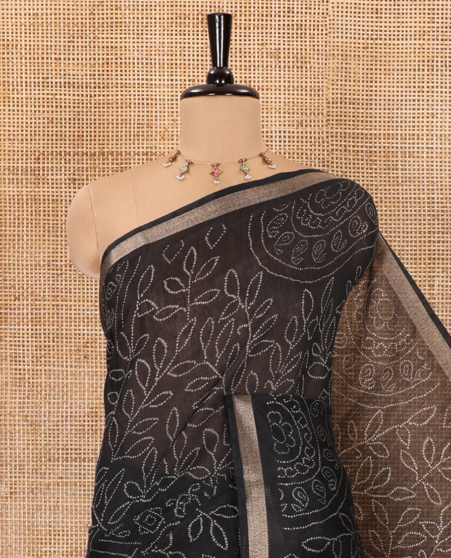 Black bandhani-style floral and chakra printed saree, zari piping border, contrast ajrakh printed pallu, and contrast ajrakh printed blouse