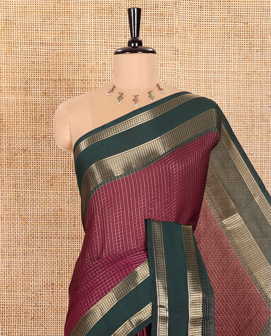 Wine Moss Chiffon Saree Subtly Sparkled with Zari Checks All Over Its Body, Complemented by a Contrast Traditional Zari Design Border, Striped Pallu, and Paired with a Contrast Blouse
