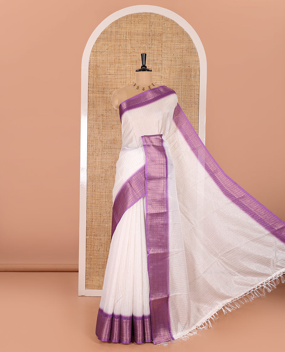 White and Lavender Dola Silk Saree Adorned with Vertical Zari Stripes All Over the Body, Complemented by a Contrast Border of Traditional Zari Designs, Self-Pallu of Stripes, and Paired with a Contrast Blouse
