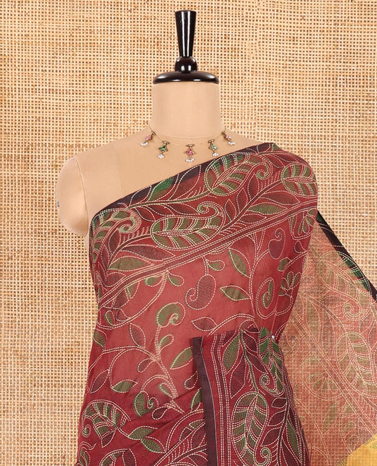 Maroon Khadi Cotton Saree Beautified with Kalamkari-Style Paisley-Floral Prints, Subtly Sparkled with Self-Border of Floral Creeper Designs, Complemented by Contrast Paisley-Floral Vine Pallu, and Paired with a Contrast Printed Blouse