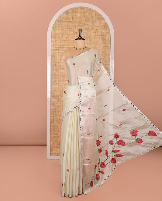 Cream and Rani Rangoli Saree, Prettified with Flower Butta Embroidered All Over Its Body, Scallop Mirror Embroidered Border, Pallu Artfully Woven with Floral Motifs Embroidery, and Paired with a Contrast Embroidered Blouse