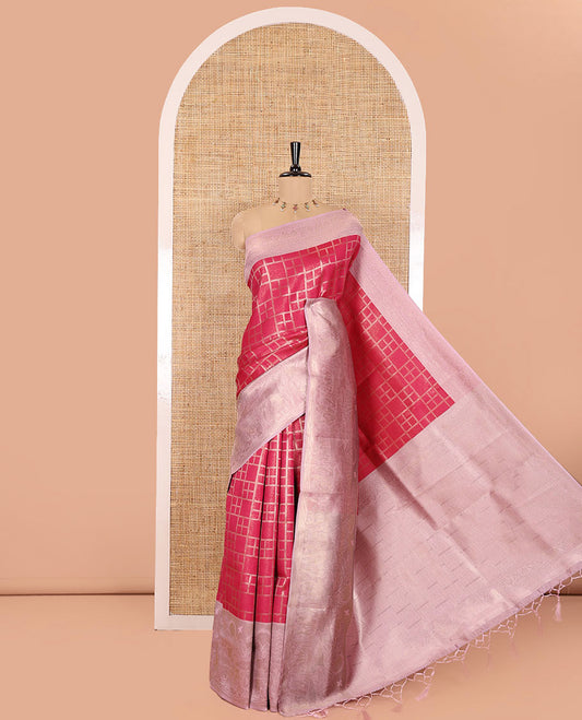 Rani Pink Elite Soft Silk Saree, Delicately Woven with Checked Design on Its Body, Complemented by a Contrast Border of Jungle-Themed Flora-Fauna Motifs, a Pallu of Checked Design, and Paired with a Contrast Blouse