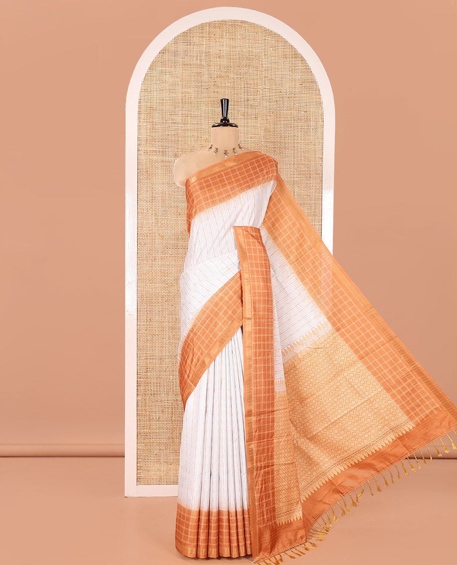 Half-White Katan Silk Saree, Accentuated with Vaira-Oosai-Style Stripes on Its Body, Complemented by a Contrast-Checked Border, Pallu of Jaal Designs, and Paired with a Contrast Blouse