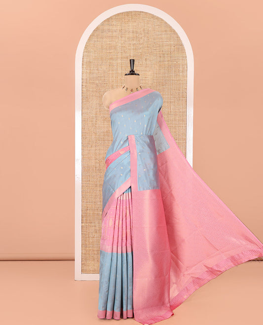 Grey and Pink Kanchi Silk Saree, Subtly Enriched with Zari Buttas and Buttas Enclosed Checks On Its Body, Complemented by Zari Border, Jaal Pallu, and Paired with a Contrast Jacquard Blouse