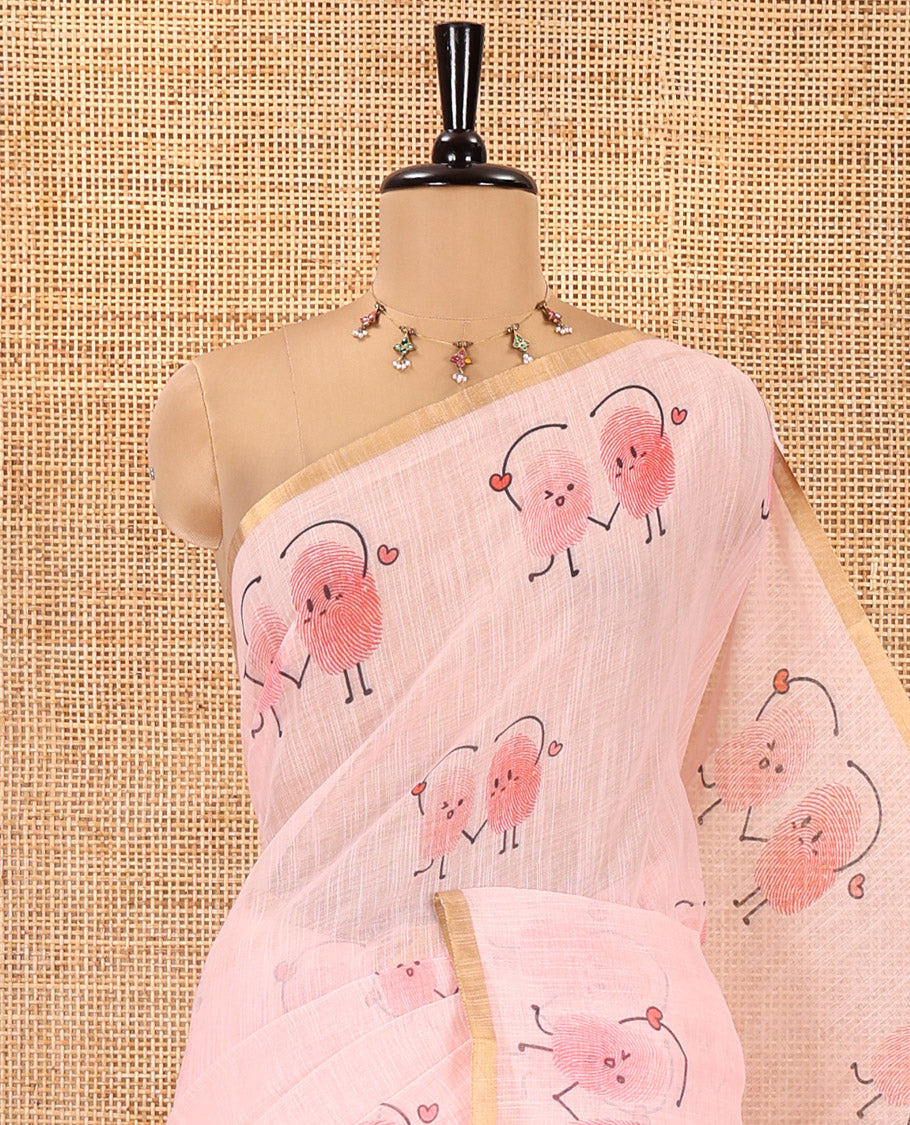 Peach Linen Cotton Saree, Creatively Printed with Thumb Finger Printed Cartoon-Theme Print on Its Body, a Subtle Piping Border, a Self-Printed Pallu, and Paired with a Matching Blouse