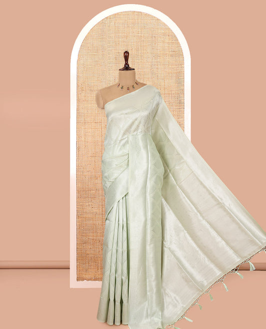 Liril Green Elite Soft Silk Saree, Subtly Sparkled with Ogee Jacquard Design, a Traditional Zari Border, Zari Pallu, and a Matching Blouse