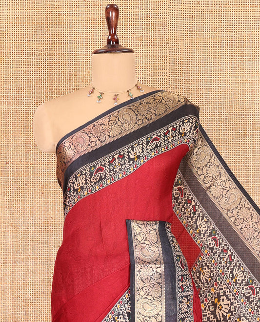 Maroon Embossed Moss Chiffon Saree, Complemented by a Contrast Traditional Zari Patola Printed Border, Patola Pallu, and a Contrast Blouse
