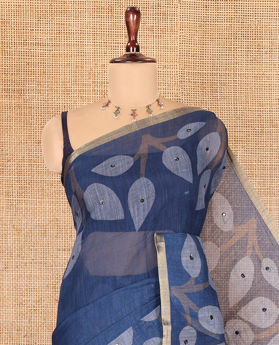 Navy Blue Linen Cotton Saree Features Leaf Print and Mirrorwork, a Piping Border, Contrast Pallu, and a Matching Blouse