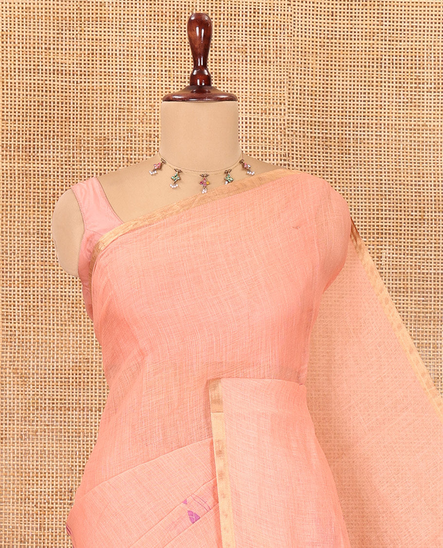 Borderless Peach Linen Cotton Saree Features Lotus Print, a Self-Pallu, and a Matching Blouse