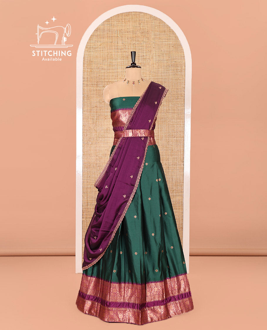 Green-Purple Semi-Banarasi Half-Saree Showcasing Zari Buttas on Its Skirt, Complemented by a Contrast Traditional Zari Temple Rettai Pettu Border, Paired with a Matching Blouse, and a Satin Georgette Embroidered Scallop Dhavani
