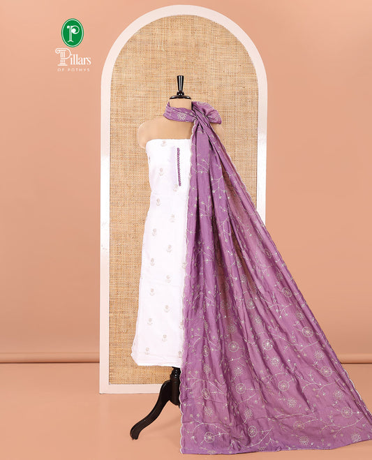 Cream with Lavender Vichitra Silk Material Chudidar Set, Elevated with Gold Zari Buttas On Its Top, a Plain Santoon Bottom, and Comes with a Floral Vine Sequins Embroidered Dupatta