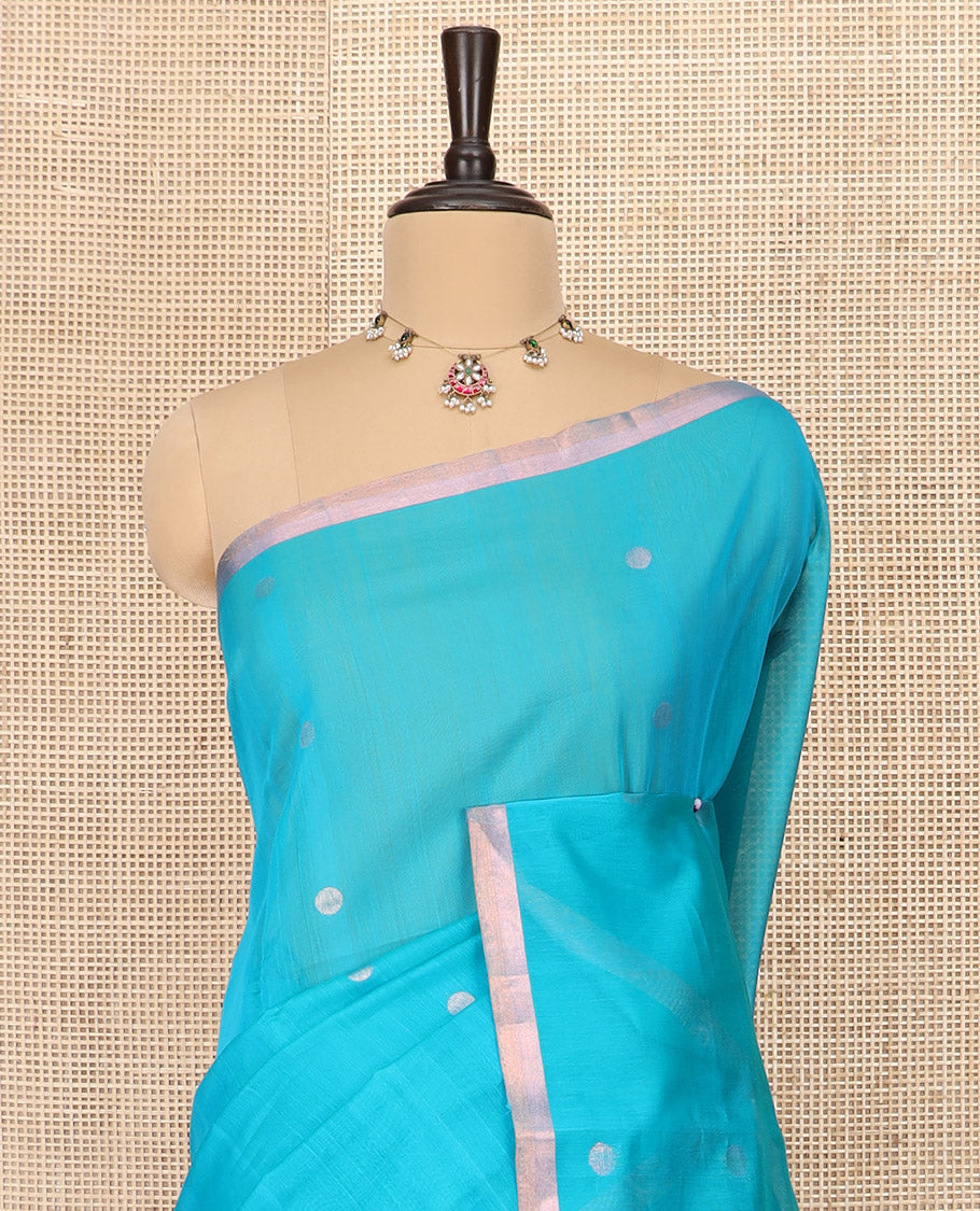 Blue Silk Cotton Saree Woven with Polka Dot Buttas All Over the Body, Subtly Woven Piping Border, Captivating Contrast Pallu of Floral Zari Designs, and Comes with a Contrast Blouse