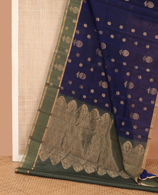 Blue floral zari buttas silk cotton saree, contrast zari buttas border and pallu of intricate Mughal style ogee patterns weave