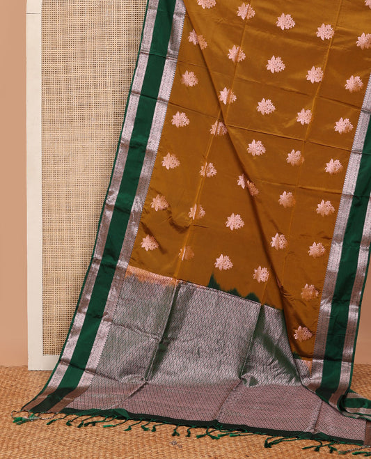 Mustard semi-soft silk saree with floral zari buttas, contrast traditional zari design border, & pallu of jaal designs