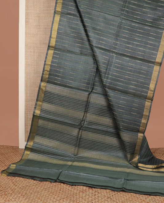 Deep forest green vertical thread striped tussar silk saree, zari border and striped pallu