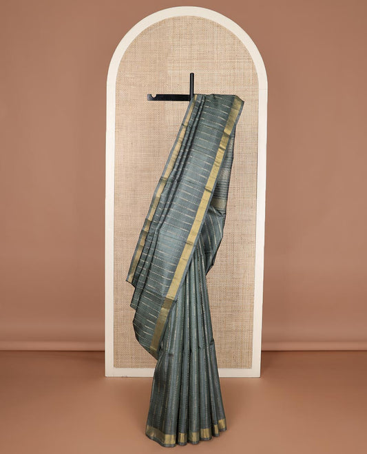 Deep forest green vertical thread striped tussar silk saree, zari border and striped pallu