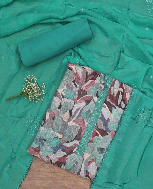 Green chudidhar material set floral printed with sequins embroidery top, plain bottom & floral motif sequins embroidery dupatta