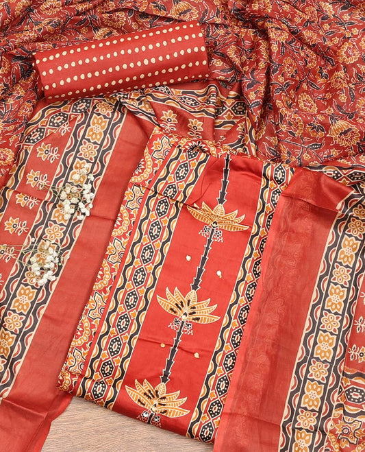 Orange Material Chudidar Set, Artfully Detailed with Ajrakh Printed Cotton Top, Complemented by Printed Cotton  Bottom, and Paired with Floral Printed Cotton Dupatta