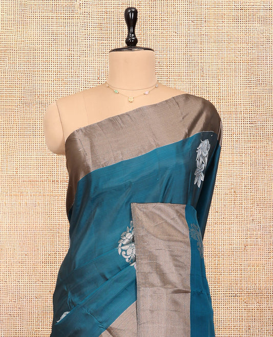 Peacock Blue Uppada Saree, Ornamented with Floral Buttas, a Bavanji Border, Contrast Intricate Pallu, and a Contrast Blouse