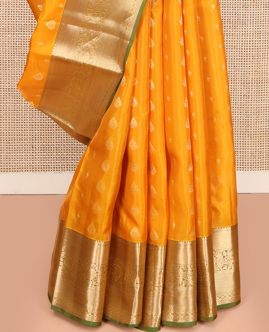 Yellow Vasundhara Lite Silk Mix Saree, Subtly Sparkled with Zari Buttas, Complemented by a Contrast Border of Thilakam Mokku, Muthu, Kodi Visiry, Diamond, and Kuyil Kann Designs, Beautifully Bedecked Pallu, and Paired with a Contrast Blouse