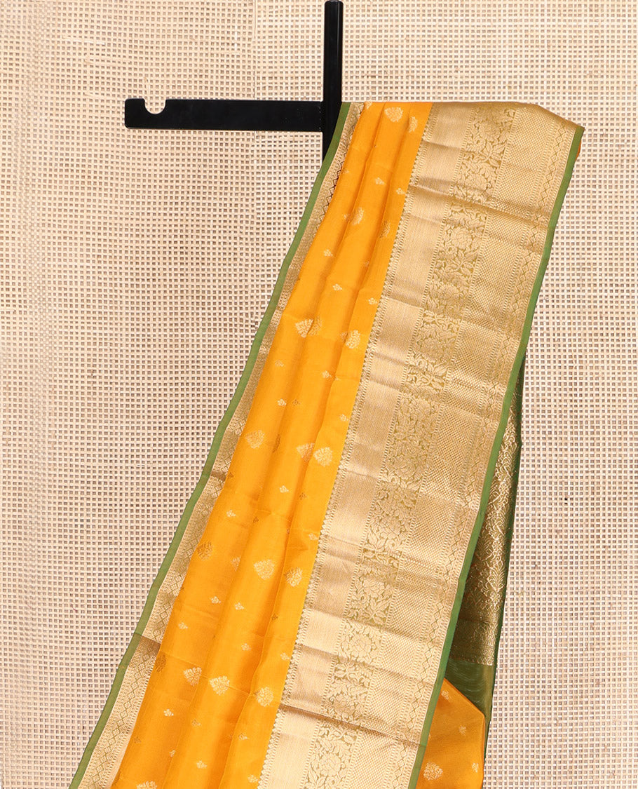 Yellow Vasundhara Lite Silk Mix Saree, Subtly Sparkled with Zari Buttas, Complemented by a Contrast Border of Thilakam Mokku, Muthu, Kodi Visiry, Diamond, and Kuyil Kann Designs, Beautifully Bedecked Pallu, and Paired with a Contrast Blouse