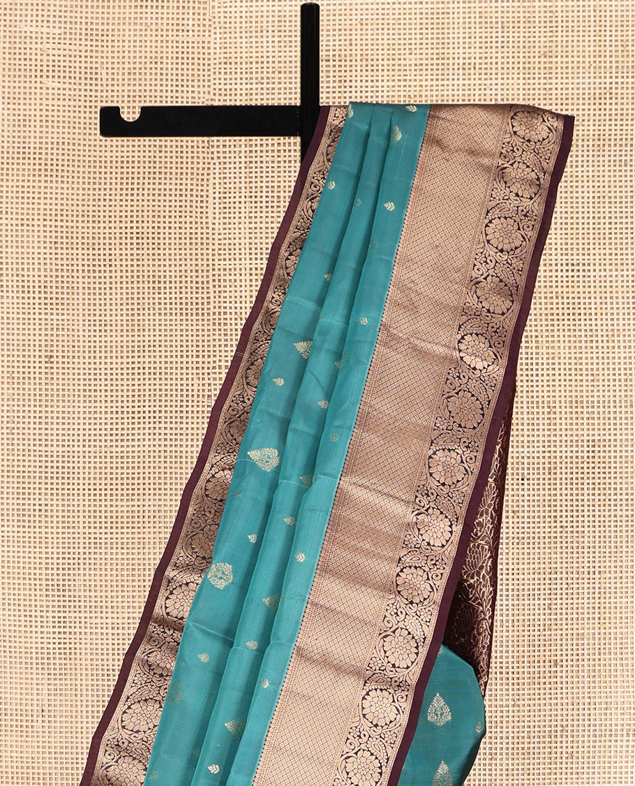 Green Vasundhara Lite Silk Mix Saree, Bedecked with Zari Buttas, Complemented by a Contrast Border of Mayil Kann and Kodi Visiry Designs, Floral Jaal Pallu, and a Contrast Blouse