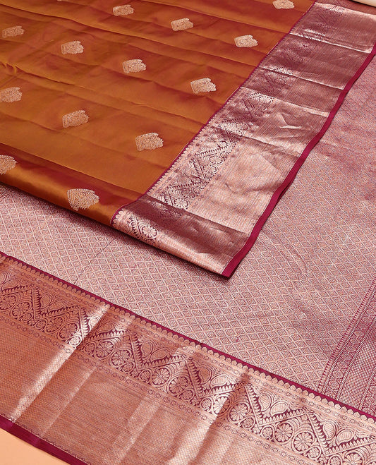 Orange Vasundhara Lite Silk Mix Saree, Richly Detailed with Zari Buttas on Its Body, Complemented by Contrast Border of Thilakam, Diamond, Kodi Visiry, Manga, and Mayil Kann Designs, Grand Jaal Pallu, and Paired with a Contrast Blouse