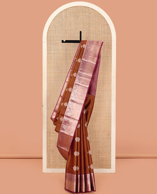 Orange Vasundhara Lite Silk Mix Saree, Richly Detailed with Zari Buttas on Its Body, Complemented by Contrast Border of Thilakam, Diamond, Kodi Visiry, Manga, and Mayil Kann Designs, Grand Jaal Pallu, and Paired with a Contrast Blouse