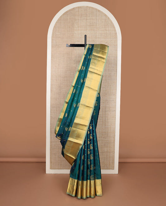 Blue manga zari buttas silk saree, contrast border of thilakam mokku,muthu,star & mayil designs & jaal pallu