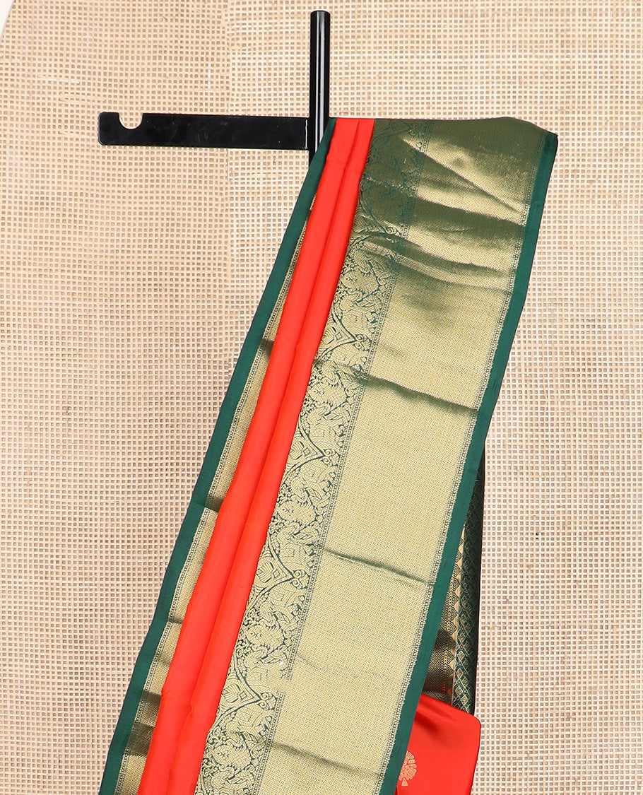 Red zari buttas silk saree, contrast border of rekku, iruthalai pakshi, yaanai, and mayil kann designs, and jaal pallu