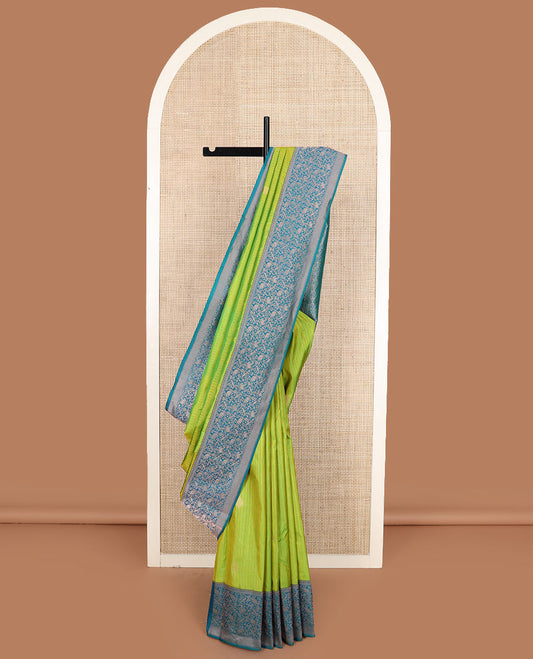 Green striped and zari buttas silk saree with contrast vanasingaram border of yaanai, killi, and kodi visiry designs, and jaal pallu