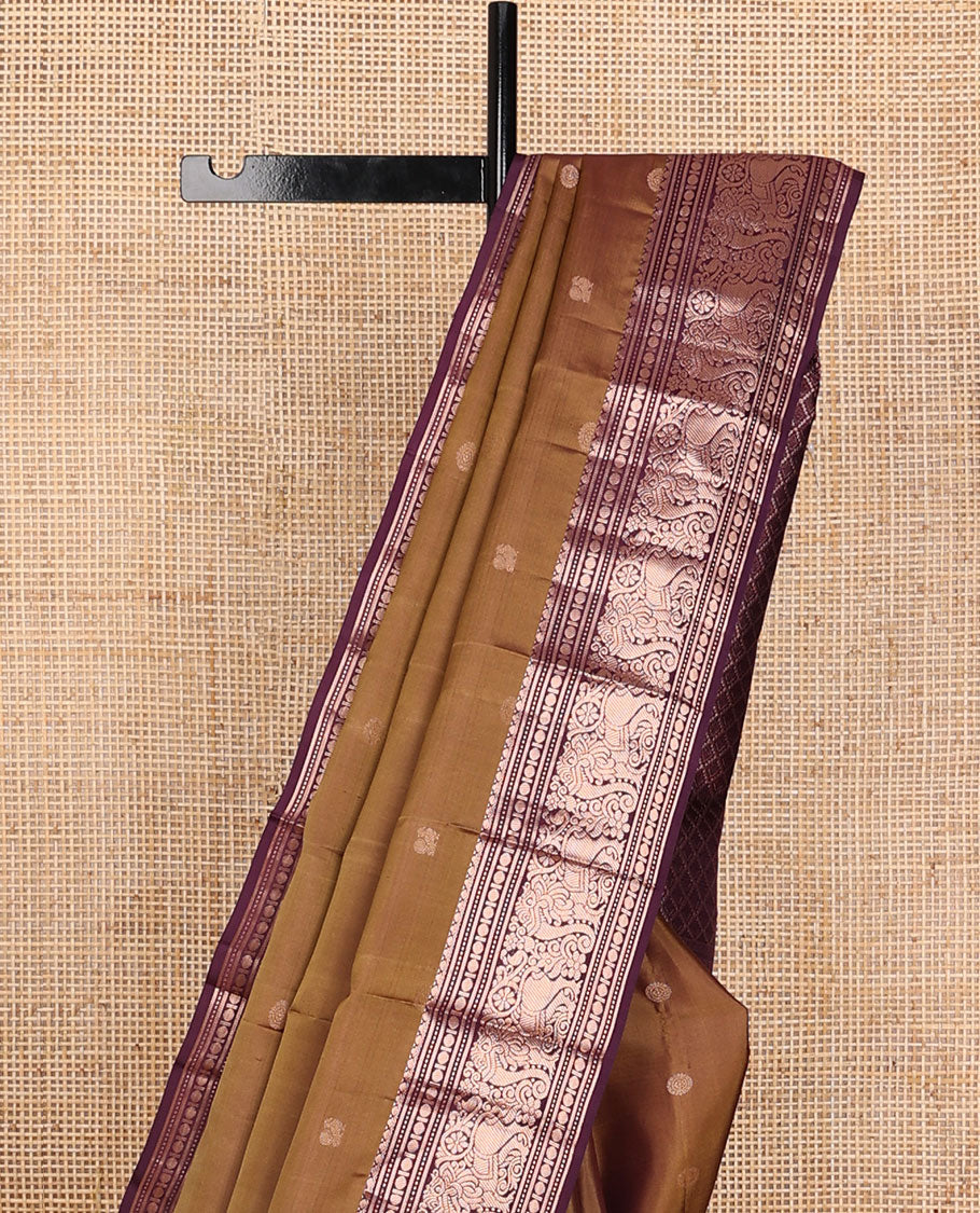 Brown mayil chakram zari buttas silk saree, contrast jaal pallu & border of paisa,muthu,banaras & yaali designs