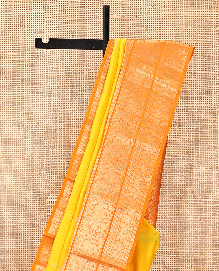 Yellow Vasundhara Silk Saree, Woven with Zari Buttas, Complemented by a Contrast Border of Muthu, Rudraksham, Poun, Mayil, Kuthirai, and Yaali Designs, Grand Pallu, and a Contrast Blouse