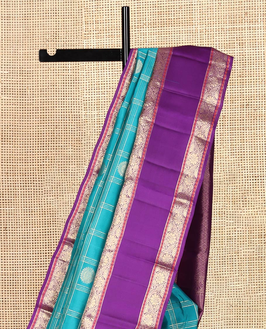 Green Vasundhara Silk Saree, Bedecked with Chakram Butta Enclosed Checks, Complemented by a Contrast Rettai Pettu Kodi Visiry Border, Grand Pallu, and Contrast Blouse