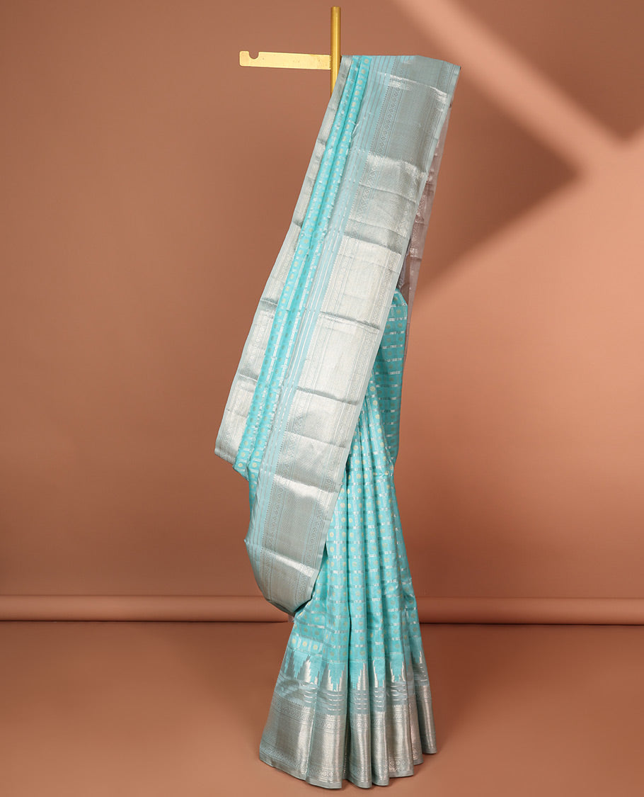 Blue checked silk saree with self border of thilakam mokku, poo chakram , kuyil kann design & intricate zari design pallu