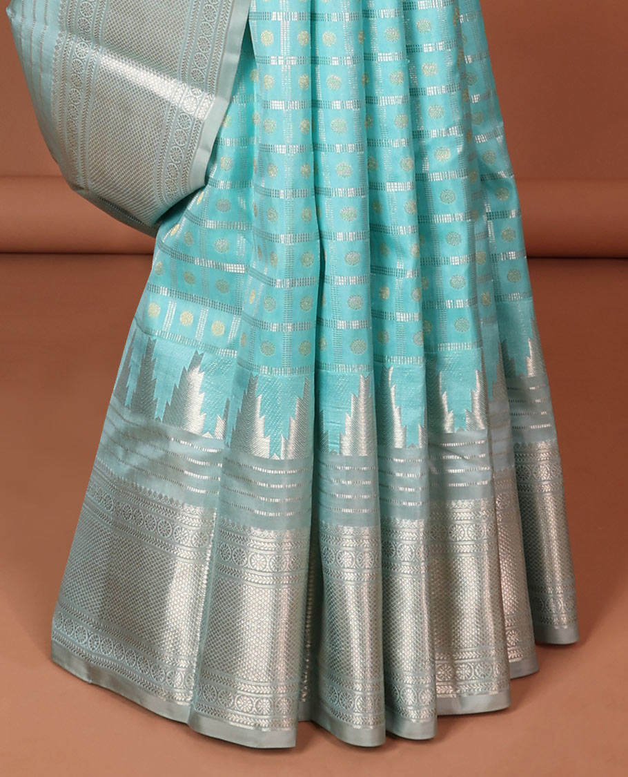 Blue checked silk saree with self border of thilakam mokku, poo chakram , kuyil kann design & intricate zari design pallu
