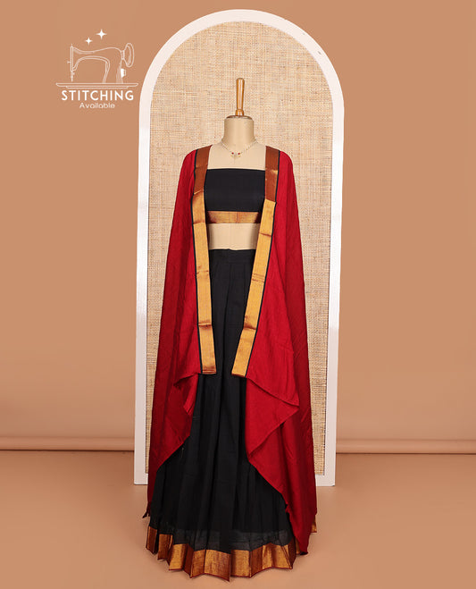 Black cotton half-saree, plain with contrast zari bordered skirt, matching blouse, and contrast zari border dhavani