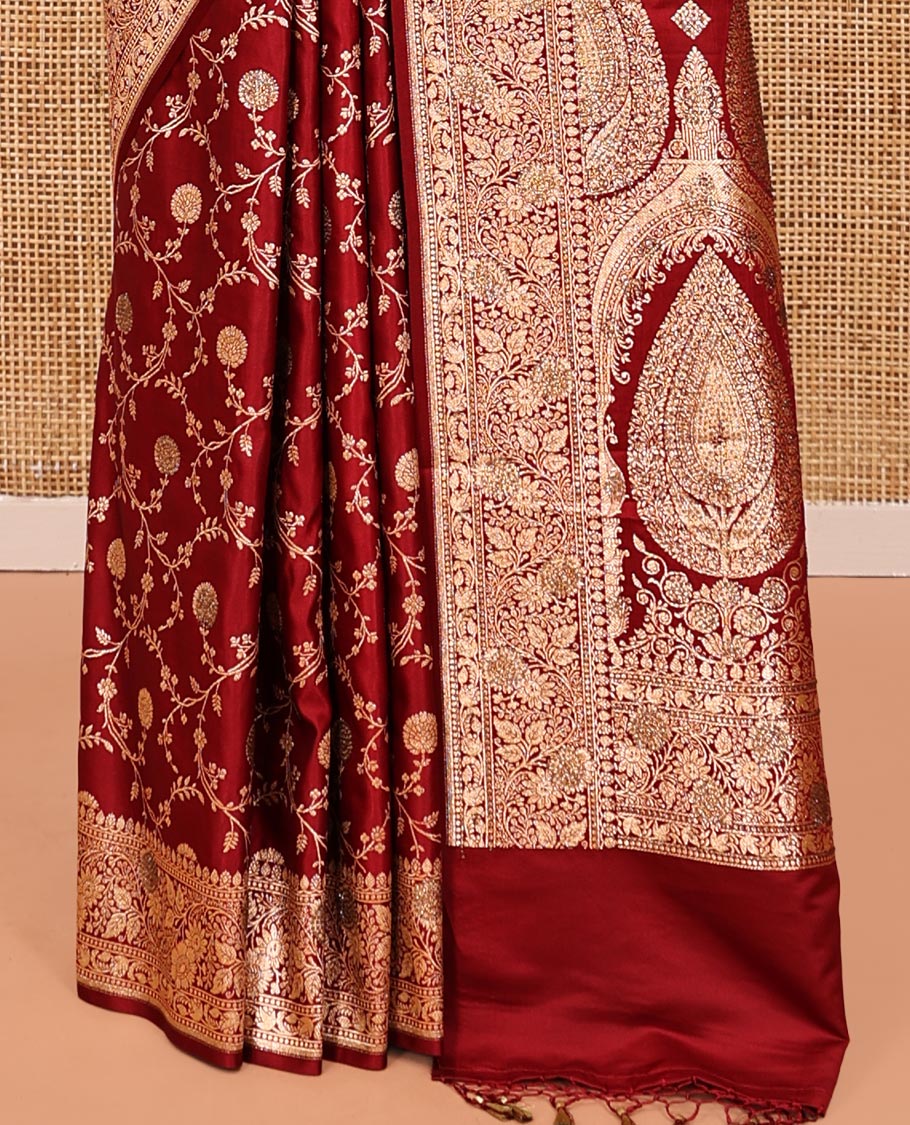 Red Banarasi Satin Saree, Gracefully Embellished with Floral Jaal Jacquard, a Floral Creeper Border, Intricate Stonework Pallu, and a Matching Blouse