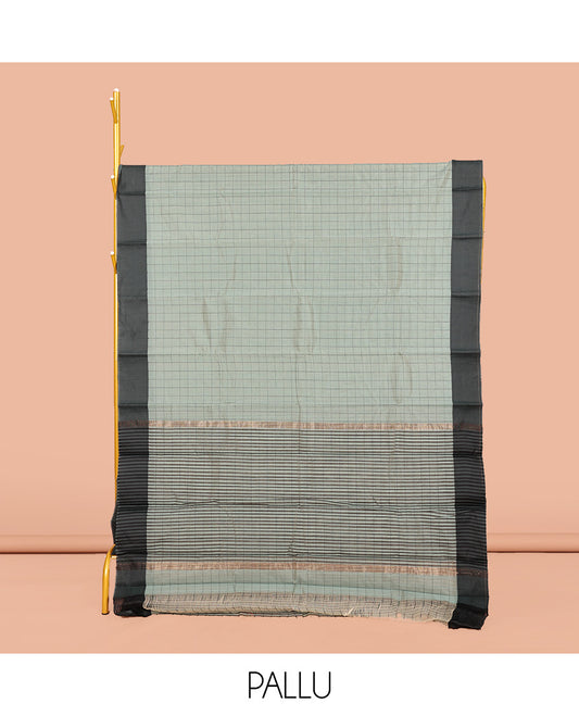 Grey Semi-Silk Cotton Saree, Subtly Sparkled with Checks All Over Its Body, Complemented by a Contrast Border, Pallu Steeped with Stripes, and Paired with a Matching Blouse
