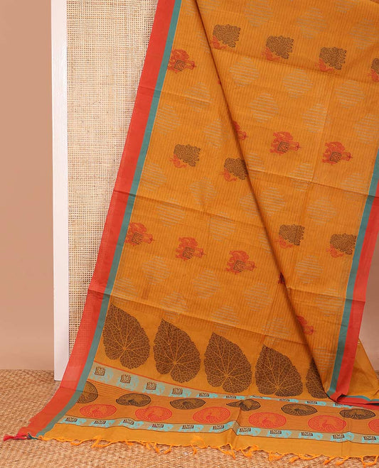 Orange geometric and animal motifs printed Coimbatore cotton saree, contrast border, and pallu of elephant, peacock and leaf motifs