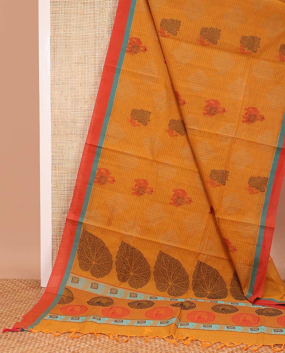 Orange geometric and animal motifs printed Coimbatore cotton saree, contrast border, and pallu of elephant, peacock and leaf motifs