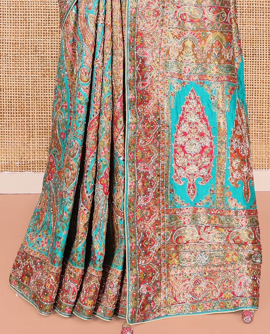 Blue Dola Silk Saree, Beautifully Bedecked with Colorful Floral-Paisley Design on Its Body, Complemented by Contrast Paisley Border, Pallu of Mughal-Style Design, and Paired with a Matching Blouse