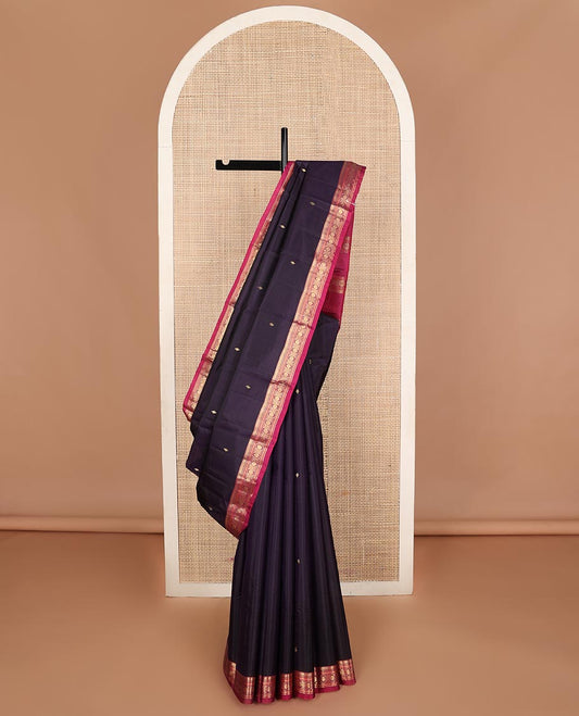 Dark blue striped with zari buttas Kanchipuram silk saree, contrast border of manga mokku,muthu,cross neli, and kamalam, and zari design pallu