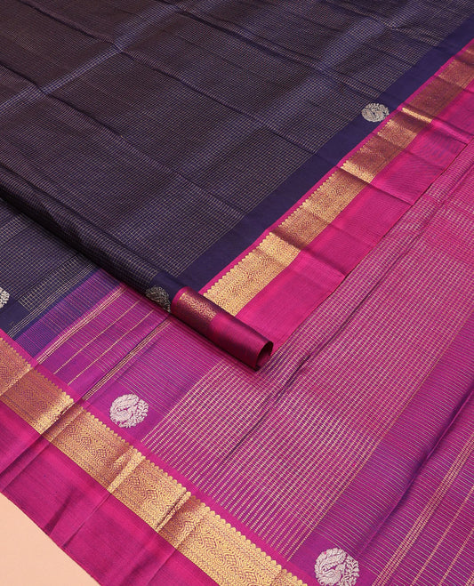 Blue checked Kanchipuram silk saree, contrast border of traditional motifs, and pallu of checked design