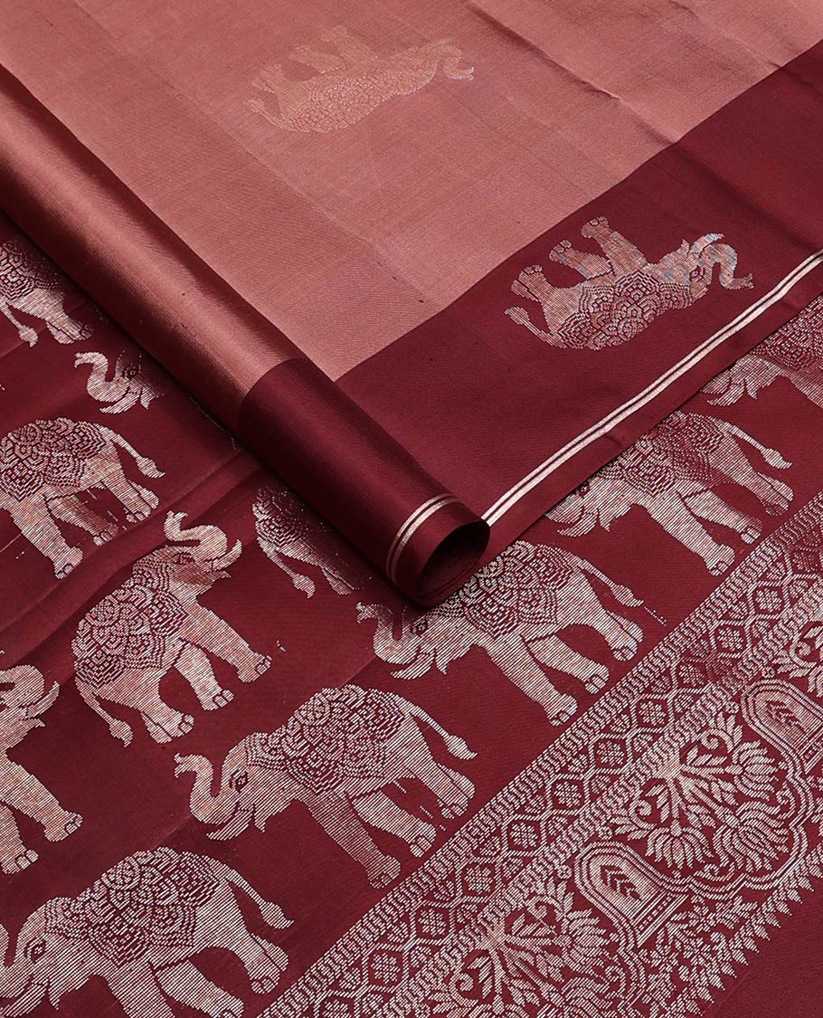Brown elephant buttas soft silk saree, contrast elephant buttas border, and pallu steeped with elephant buttas