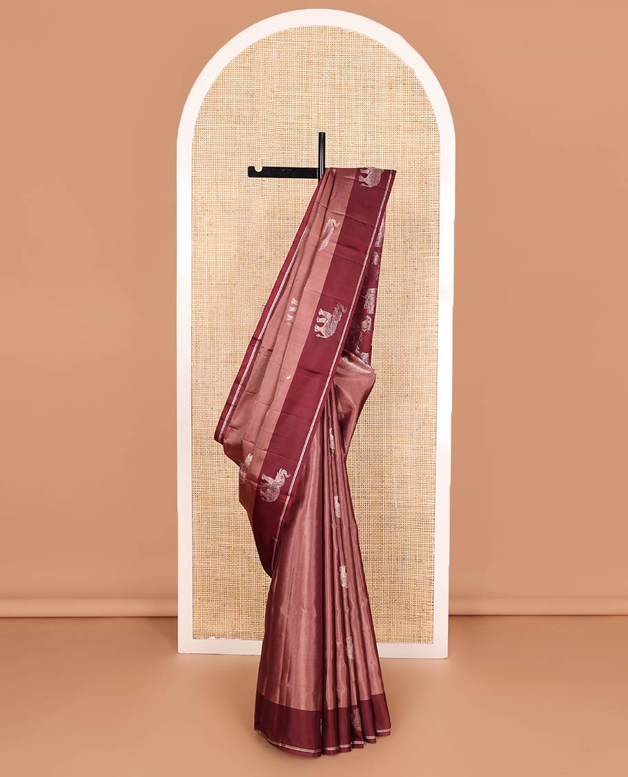 Brown elephant buttas soft silk saree, contrast elephant buttas border, and pallu steeped with elephant buttas