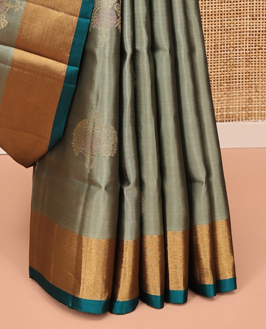 Green Mayuri Lite Silk Mix Saree, Subtly Sparkled with Zari Buttas on Its Body, Complemented by a Contrast Bavanji Border, a Contrast Pallu of Intricate Designs, and Paired with a Contrast Blouse