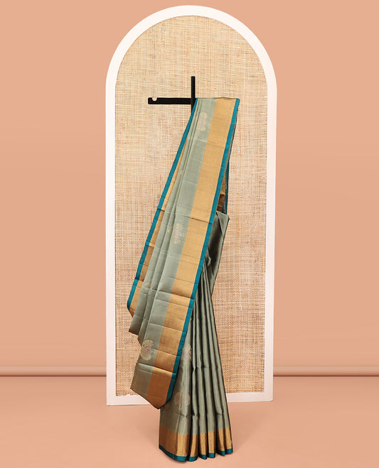 Green Mayuri Lite Silk Mix Saree, Subtly Sparkled with Zari Buttas on Its Body, Complemented by a Contrast Bavanji Border, a Contrast Pallu of Intricate Designs, and Paired with a Contrast Blouse